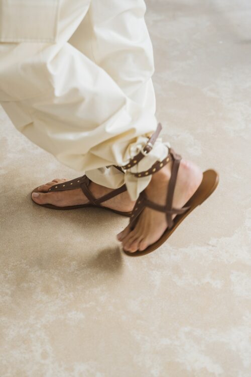 Greek strap sandal with brown studs
